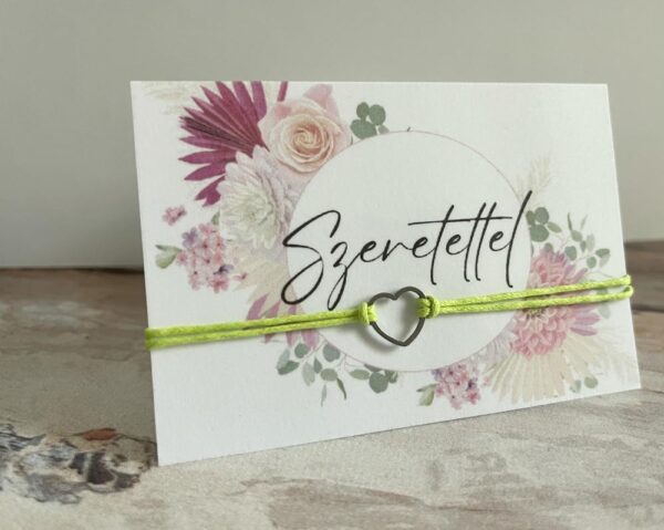 product_image_1723895888.jpg Világoszöld csúszócsomós karkötő rozsdamentes acél szívvel, laminált kártyával, "Szeretettel" felirattal