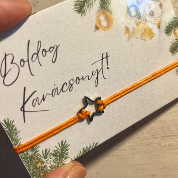 Narancssárga karkötő rozsdamentes acél csillaggal, "Boldog Karácsonyt!" feliratos laminált kártyával